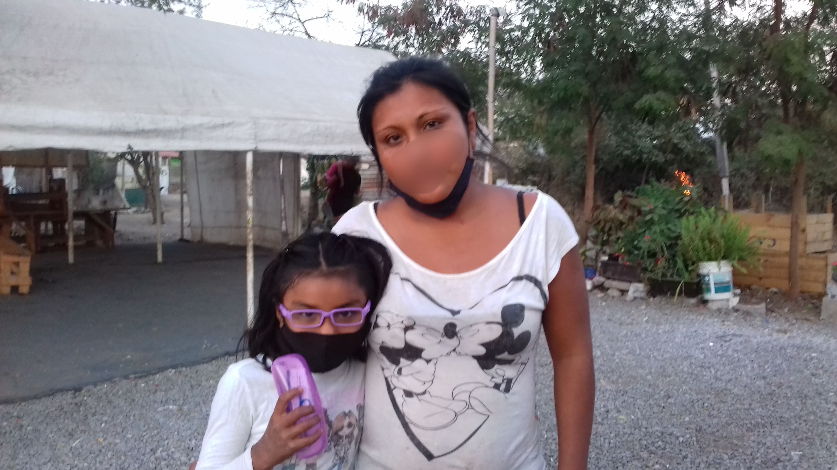 Child receiving new prescription glasses