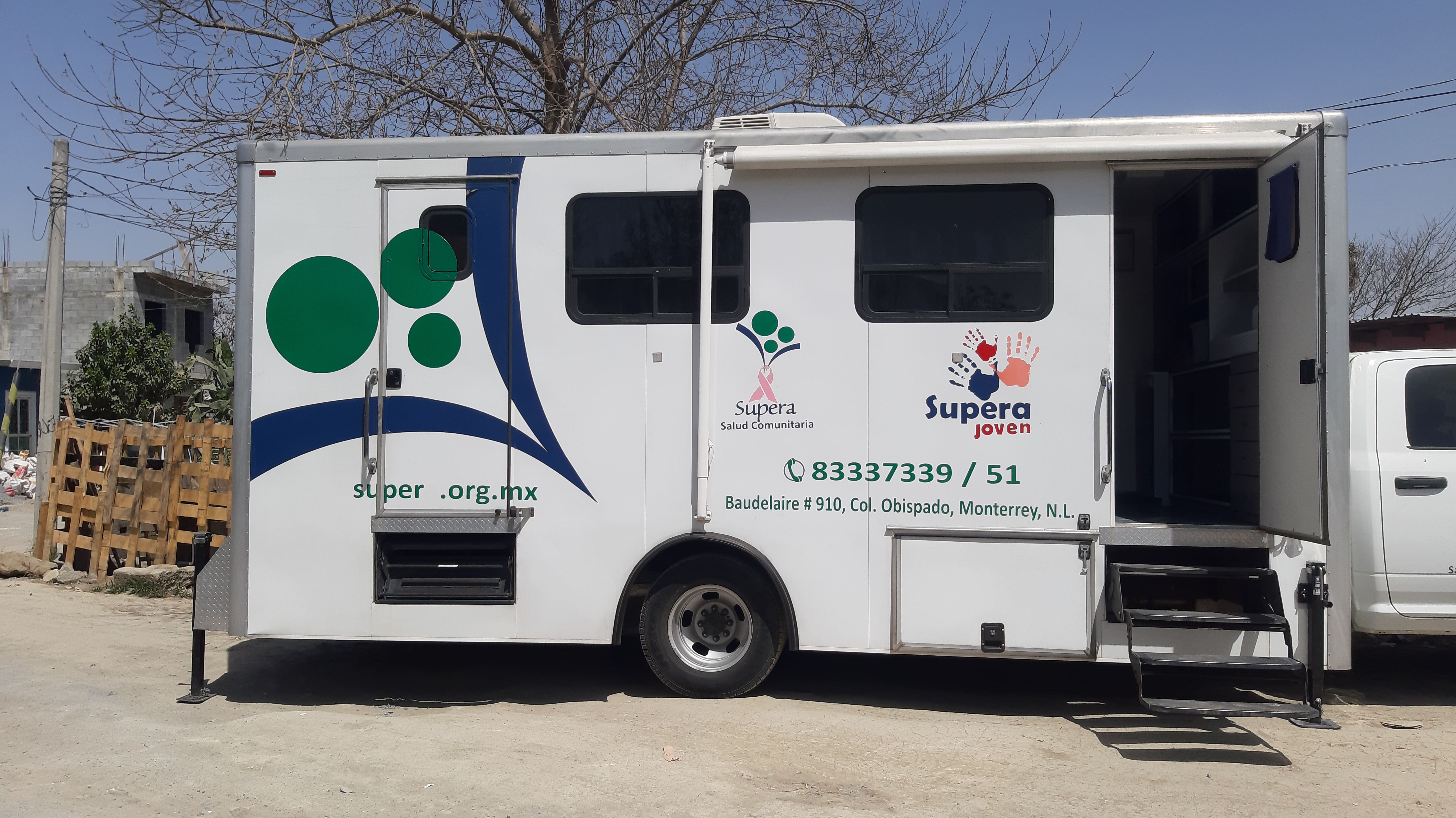 Volunteers distributing medicine prescriptions